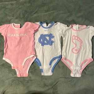 Nike bundle of Carolina onesies in 3-6 month